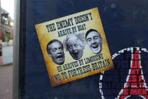 poster depicting Farage, Johnson and Rees-Mogg
